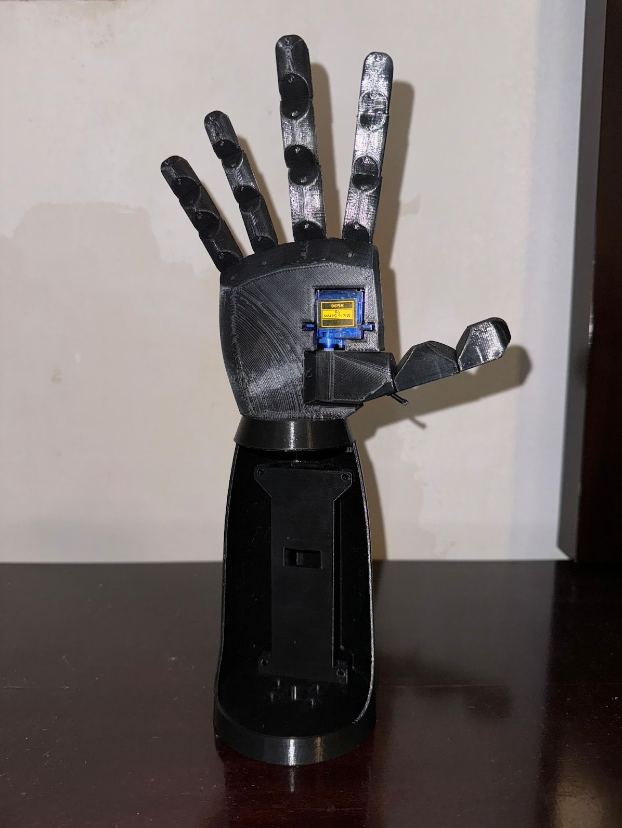 PRÓTESIS DE BRAZO DE BAJO COSTO POR CONTROL DE VOZ